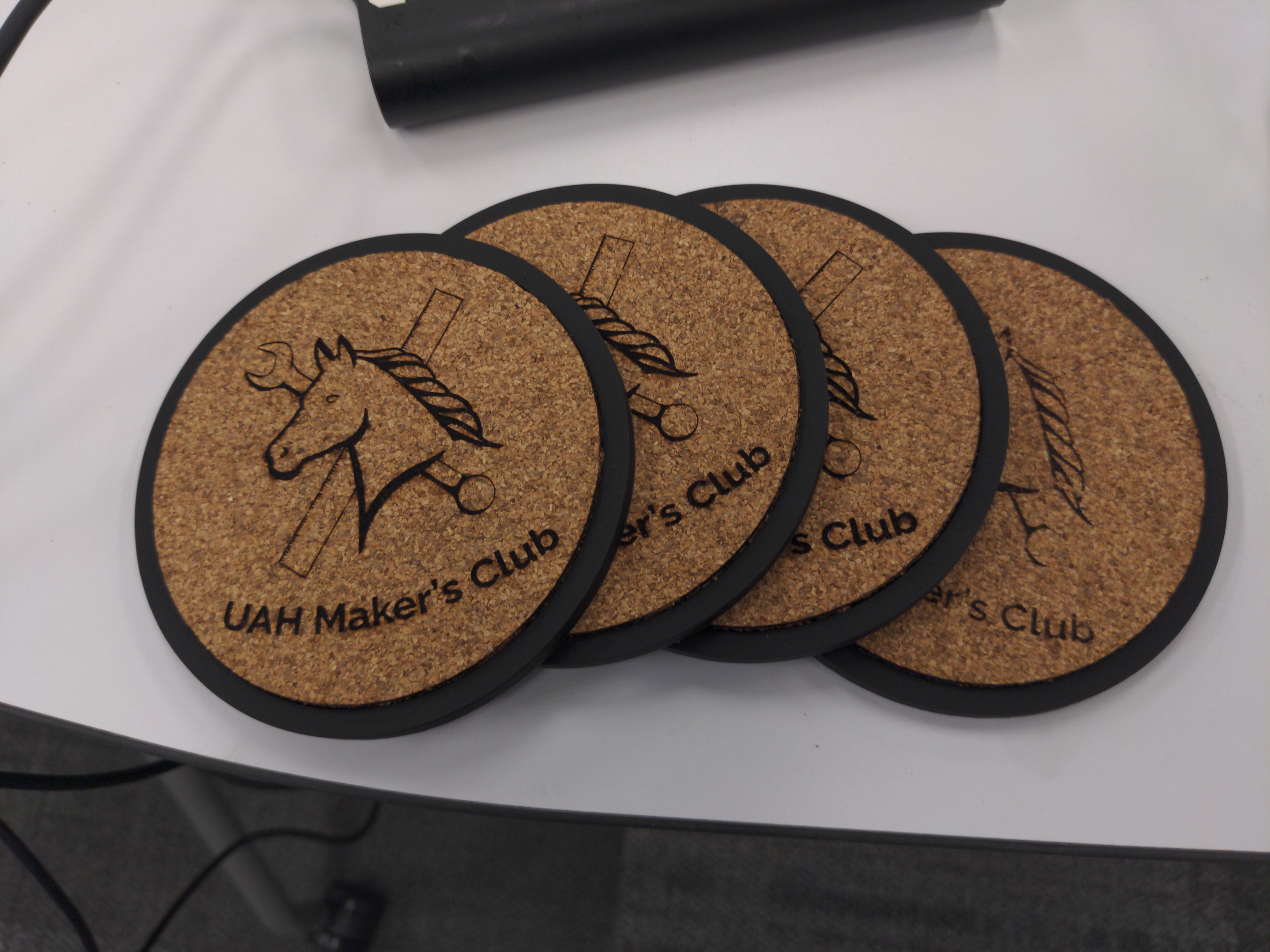 Makers Club promotional coasters